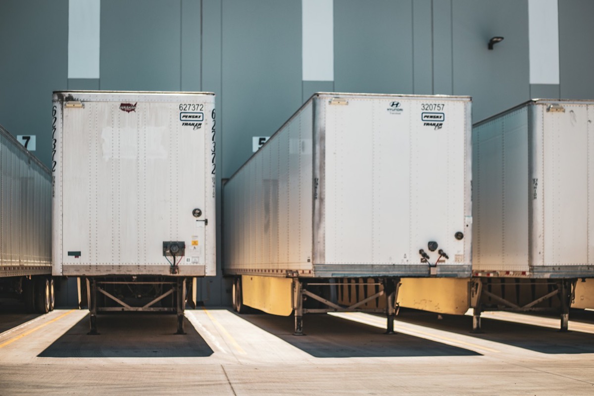 Trailers backed into loading dock positions at a distribution centre